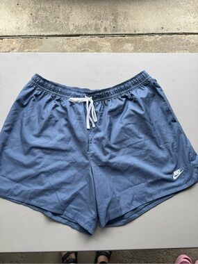Nike Men's Blue Athletic Shorts with White Drawstring